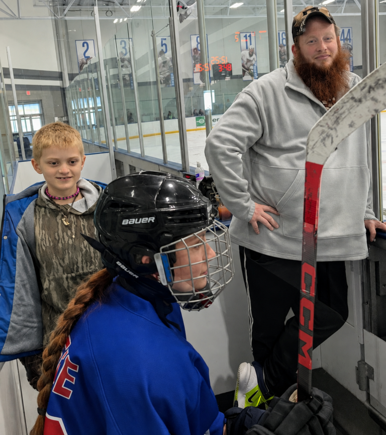 To the Hockey Dads Standing in the Background